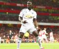 EPL PHOTOS: Arsenal sunk by late Gomis header