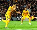 Champions League PHOTOS: Barca rally to beat 10-man Atletico; Bayern edge Benfica