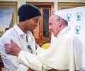 PHOTOS: Football fan Pope Francis meets Ronaldinho