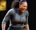 Serena falls ill after eating dog food but reaches Italian Open quarters