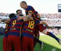 PHOTOS: Suarez 'tricks' Barcelona to La Liga title