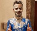 PHOTOS: Virat Kohli gets face full of cake