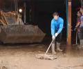 PIX: Nadal joins volunteers in clean-up op after floods in Majorca