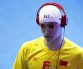 Coach defends 'drug cheat' Sun, slams critics
