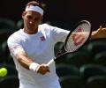 Federer opposes on-court coaching