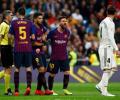 Barca hailed as champions-elect after beating Madrid