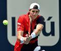 Federer to face Isner in Miami final