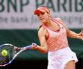 Jittery champion Kenin brushes off leg injury concerns