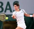 Cancer beaten, gritty Suarez Navarro falls on return