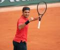 Federer happy to find higher gear against Cilic