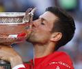 Djokovic fights back to win second French Open