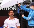 Djokovic fumes at umpire in rain-affected Rome opener