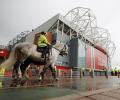 Liverpool arrive at Old Trafford amid fan protest