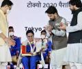 Sports Minister felicitates triumphant Paralympians