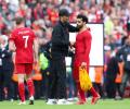 Soccer: Salah 'will be with Liverpool next season'