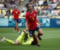 PIX: Spain rally to down Japan; US, Germany make solid start