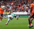 Celtic thrash Dundee Utd to seal Scottish title in style