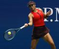 PIX: Raducanu wins first US Open match since 2021