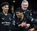 Manchester City survive scare; Spurs hold Newcastle