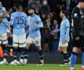 CL PIX: Man City survive scare, Real storm through