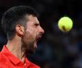Can Norrie halt history-chasing Djokovic?