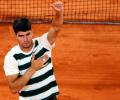 PIX: Merciless Alcaraz flattens Paul; Musetti ousts Tiafoe