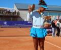 Osaka lifts trophy after 3-year and motherhood break