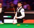 PIX: Back from ban, China's Zhao is World snooker champion