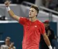 Djokovic protege Mensik beats the jeers and Muller to advance