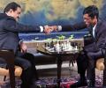 Praggnanandhaa plays chess with Gautam Adani