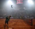 Fireworks smoke brings Italian Open match tohalt