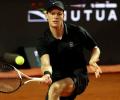 Jannik Sinner on brink of Italian Open history before rain halts semi-final