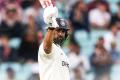 PIX: Karun leads India's recovery on rain-hit Day 1