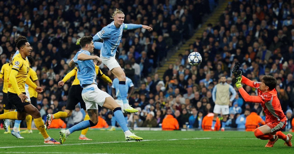 PIX: Haaland haunts Dortmund, Foden fires in City win
