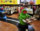 IMAGES: A restaurant where robots cook and serve food