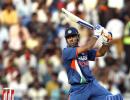 Dhoni's century sets up big win for India