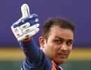 Sehwag's ton helps India storm into final