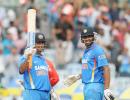 Dhoni happy being a 'punching bag'