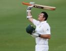 Smith posts patient century to defy Australia