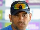 Dhoni 'wary' of dew factor, could bowl first