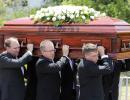 Australia's final goodbye to Hughes in hometown funeral