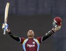 Samuels fires hundred as crisis-hit Windies stun World champs India