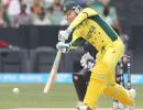 Clarke scores half-century on return as Australia rout UAE