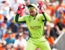 The strange case of Umar Akmal's gloves!