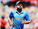 Kohli keeps wickets to give Dhoni a one-over break