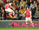 EPL PHOTOS: Arsenal coast past Hull, close in on Champions League berth