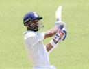 Rahane's century gives India big lead on rain-hit day