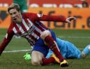 Torres reaches century, Atletico keep pressure on Barca