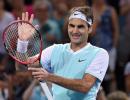 Federer battles past Dimitrov, Azarenka sails into final