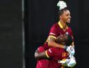 Simmons, Russell lead West Indies to shock win over India